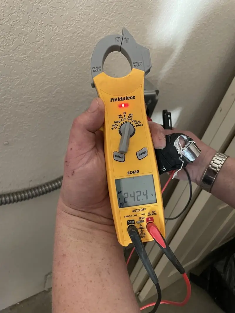 Voltage testing with clamp meter during Generator Installation in Thomaston